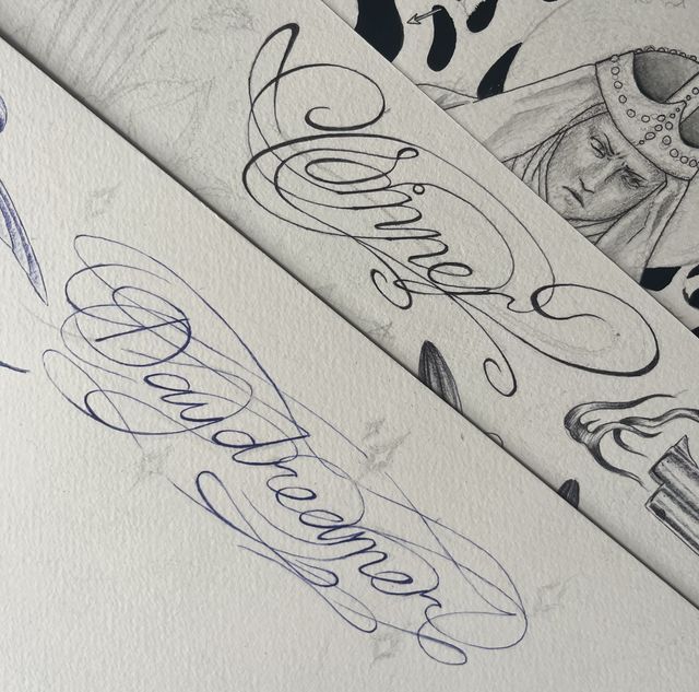 Script lettering flash — 'Wine' and 'Daydreamer' in fine calligraphy with sparkles.
